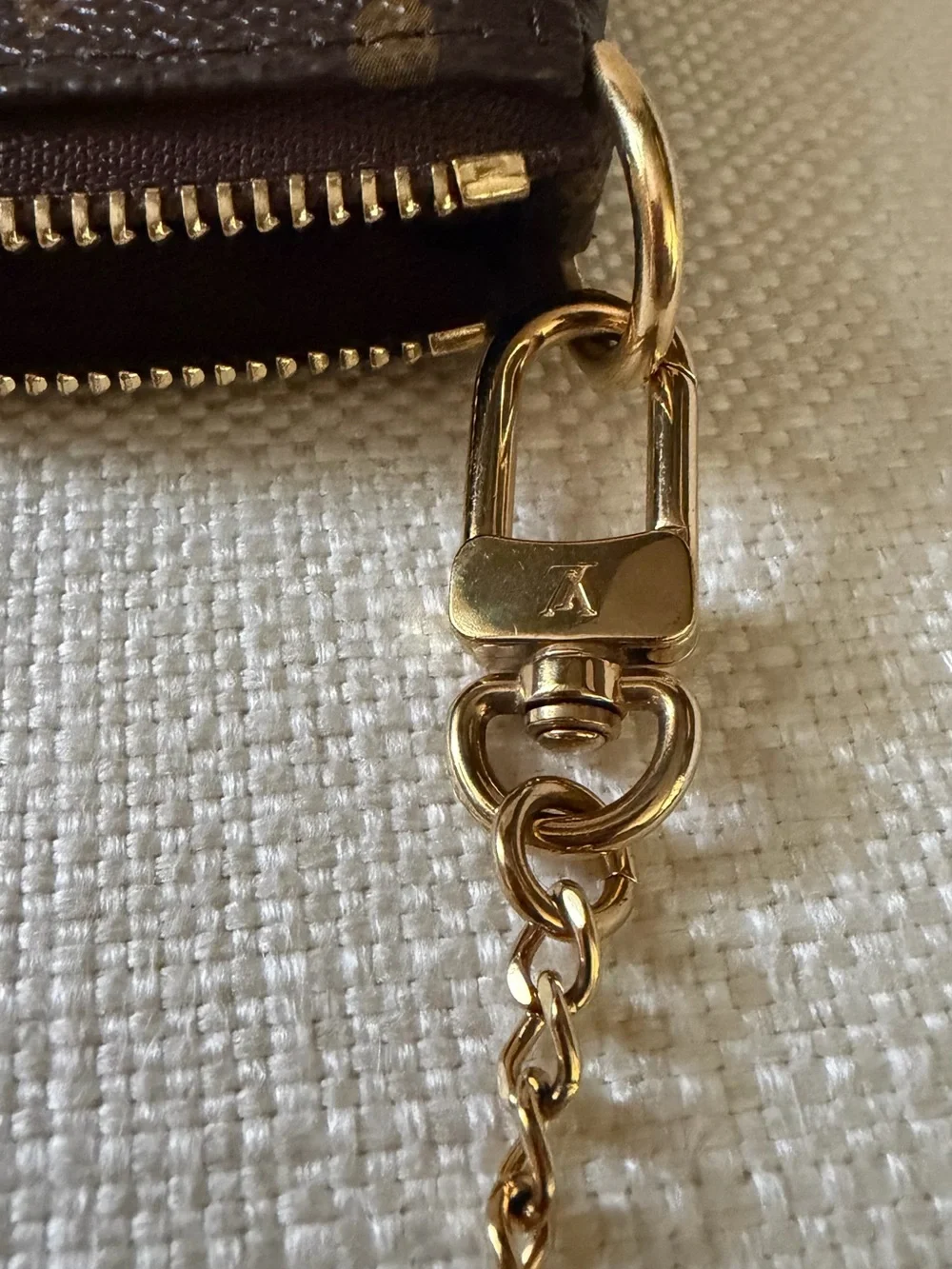 Louis Vuitton Monogram Mini Pochette in Brown with Gold Chain
